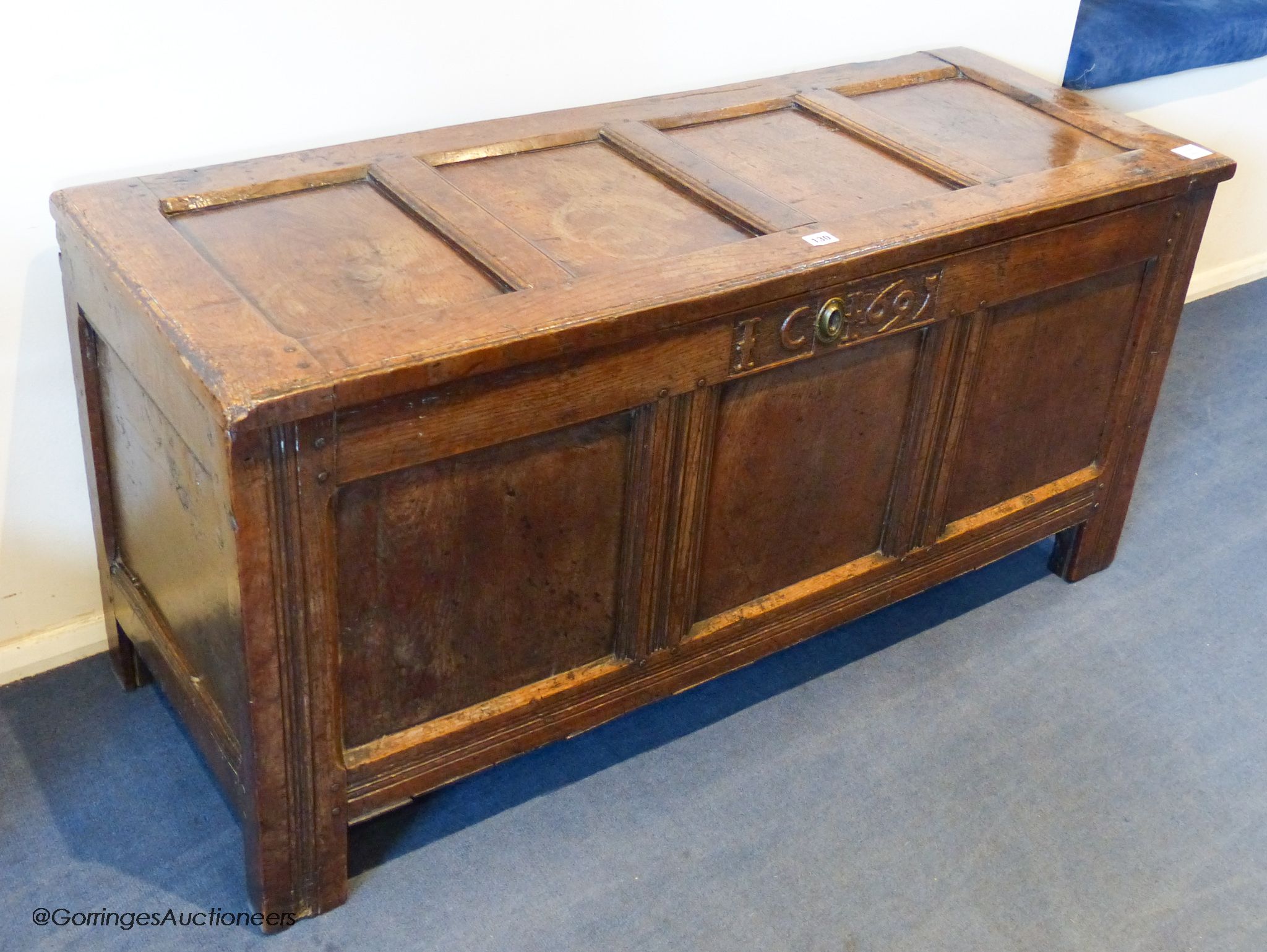 A William III oak coffer, dated 1695, 124 cm wide, 60 cm high, 46.5 cm deep